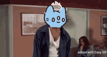 a man in a blue jacket has a cartoon cat on his head and the words edited with easy gif on the bottom