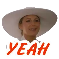 a woman wearing a white hat says yeah