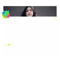 a woman wearing a green hat and a man with a beard are smiling