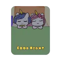 two unicorns are sleeping on a bed with the words good night written on the bottom