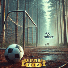 a soccer ball is in front of a goal in the woods with a sbobet logo