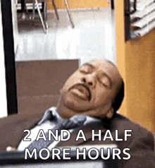 a man in a suit and tie is sleeping with the words " 2 and a half more hours " below him