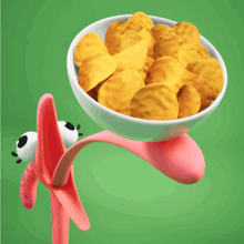 a bowl of chips sits on a pink spoon
