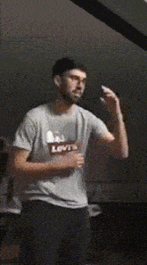 a man wearing a levis shirt is dancing