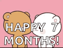 a happy 7 months greeting card with two teddy bears kissing