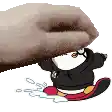 a hand is holding a cartoon character with a hoodie on .