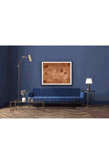 a framed painting hangs on a wall above a dresser