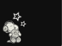 a black and white drawing of snoopy holding a record and wearing headphones