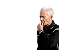 a man in a black shirt is holding his fist in the air .