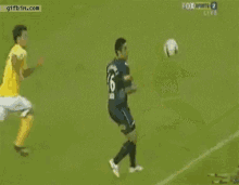 a soccer player wearing a number 6 jersey kicks the ball