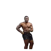 a shirtless man in shorts is flexing his muscles on a white background