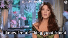 a woman in a green dress says i know i 'm a f * * king good friend