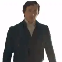 a man in a blue suit and white tie is making a funny face