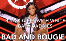 a woman in a fur coat stands in front of a microphone and says " black girls with white baby daddies bad and boogie "