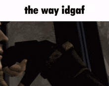 a picture of a man with the words " the way idgaf " below him