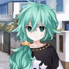 a girl with green hair and a star on her shoulder is wearing a black shirt with stars on it .