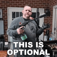 a man holding a gun with the words " this is optional " written below him