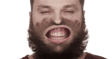 a man with a beard is making a funny face with his mouth wide open