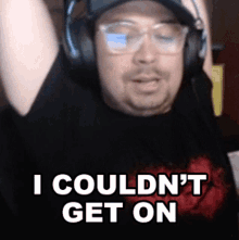 a man wearing headphones and glasses says " i couldn 't get on "