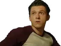 a man with a surprised look on his face is wearing a maroon shirt