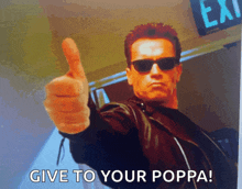 a poster of arnold schwarzenegger giving a thumbs up with the words give to your poppa