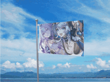 a flag with a picture of a girl on it is flying in the wind