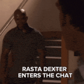 a man standing on a set of stairs with the words " rasta dexter enters the chat " below him