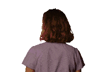 a woman with pink hair is wearing a purple shirt .