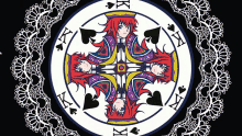 a circular design with a king and queen of spades in the center