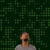 a man is looking up at the number 18