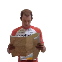 a man in a red and white cofidis jersey holds a map