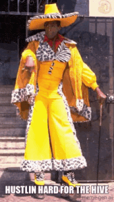 a man in a clown costume with the words hustlin hard for the hive