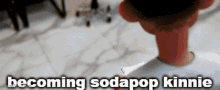 a picture of a person with the words becoming sodapop kinnie written on it