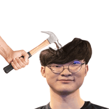 a man wearing glasses is holding a hammer over his head