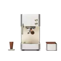 a stainless steel espresso machine with a wooden handle and a wooden cup