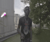 a man wearing headphones and a black shirt with a devil on it