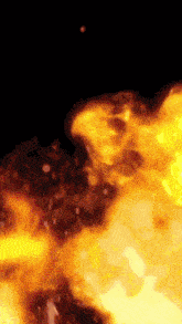 a close up of a fire explosion with a black background