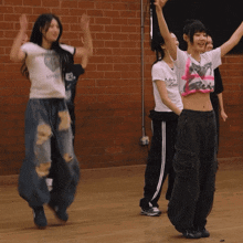 a girl wearing a crop top that says love