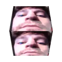 a close up of a man 's face with a beard