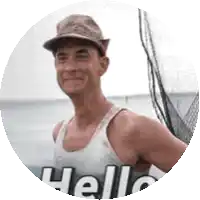 a man wearing a hat and a tank top with the word hello written on it