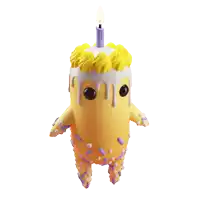 a figurine of a birthday cake with a lit candle on top