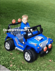 a young boy is sitting in a blue jeep with the words kidsgettinghurt written on the bottom