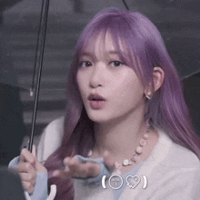 a girl with purple hair is holding an umbrella and making a face