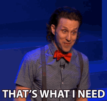 a man wearing a bow tie and suspenders is saying that 's what i need