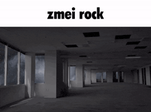 a large empty room with the words zmiei rock on the top
