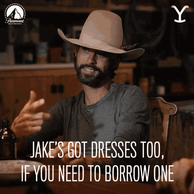 a man in a cowboy hat says " jake 's got dresses too " if you need to borrow one