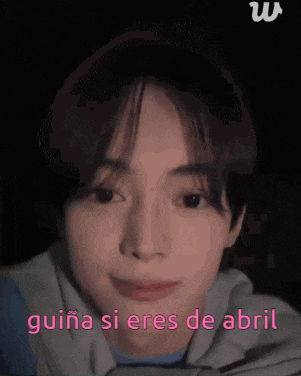 a close up of a person 's face with the words `` guiana si eres de abril '' written above it .
