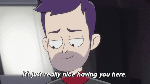 a man with purple hair and a beard says " it 's just really nice having you here "