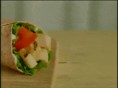 an ad for tim hortons chicken wrap snacker for $ 1.99