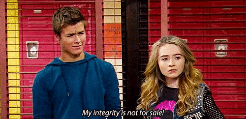 a boy and a girl are standing next to each other and the girl is saying `` my integrity is not for sale . ''